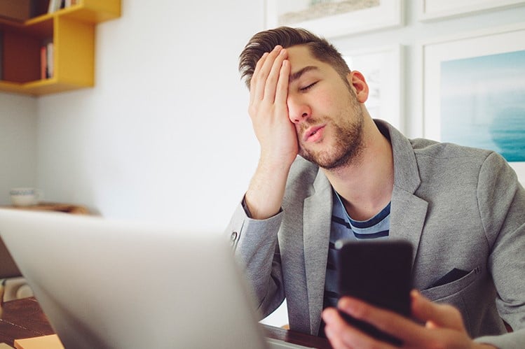 Picture of man looking distressed. Work from home? Easy. Until the database slows to a crawl.